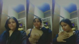 Beautiful babe with big boobs licks her nipples
